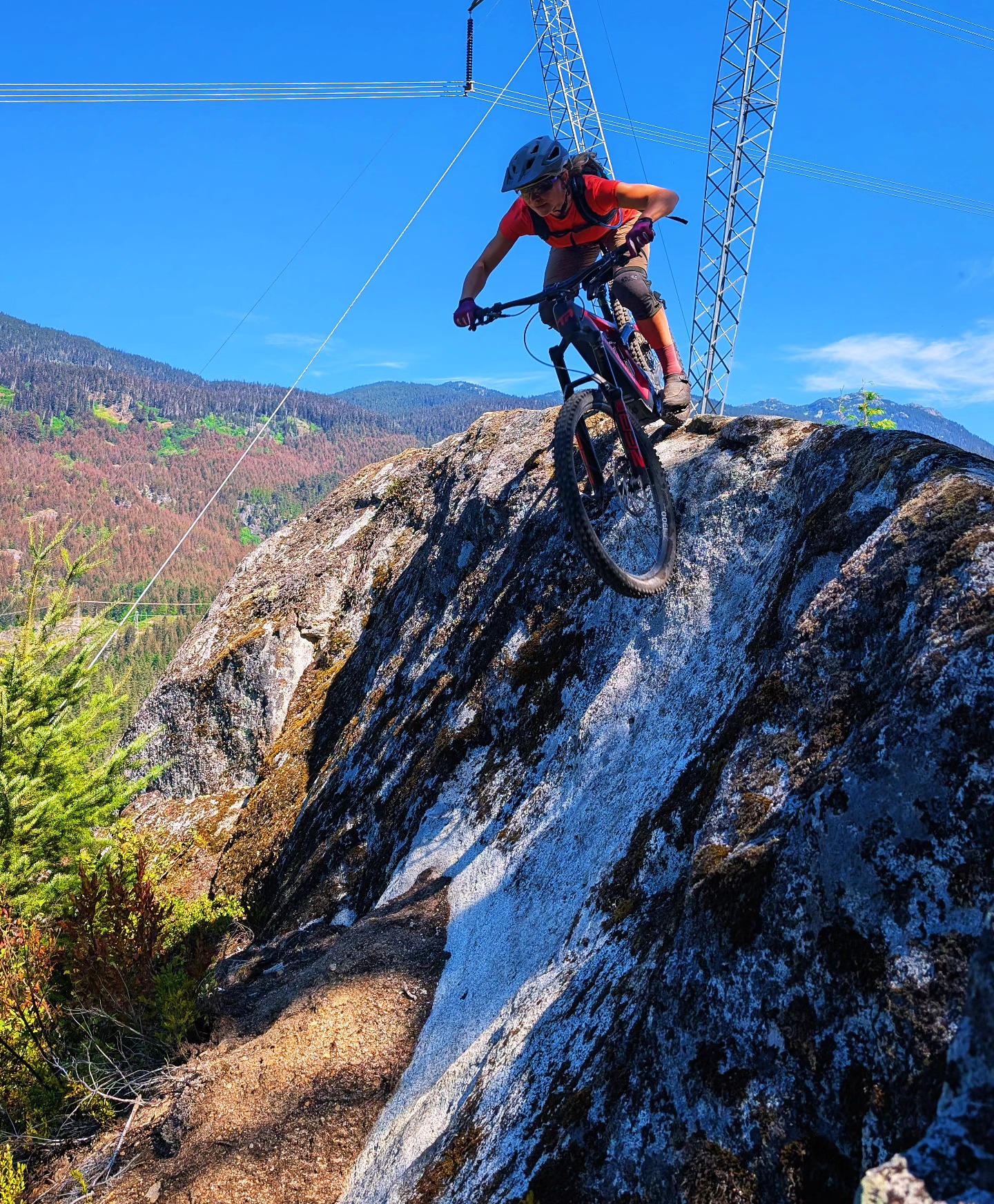 Zoe Dawson riding a rocky trail in Squamish BC